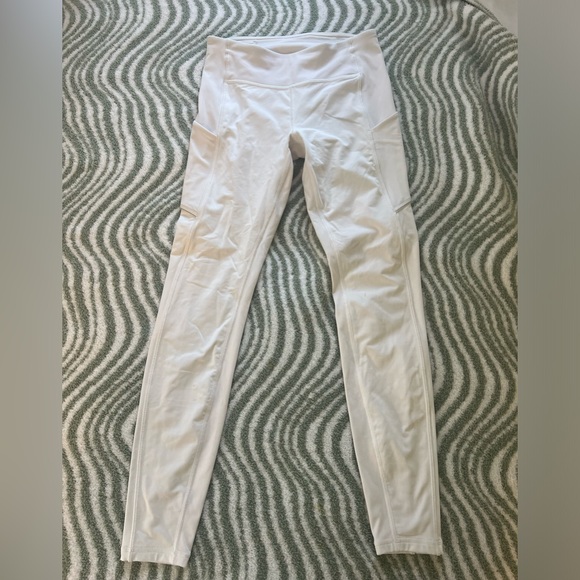 Never worn Lulu Lemon white leggings with side pockets. Size 6 - Picture 1 of 4